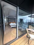 Customized Color Soundproof Space Capsule Prefab Tiny House with Wall 50/75