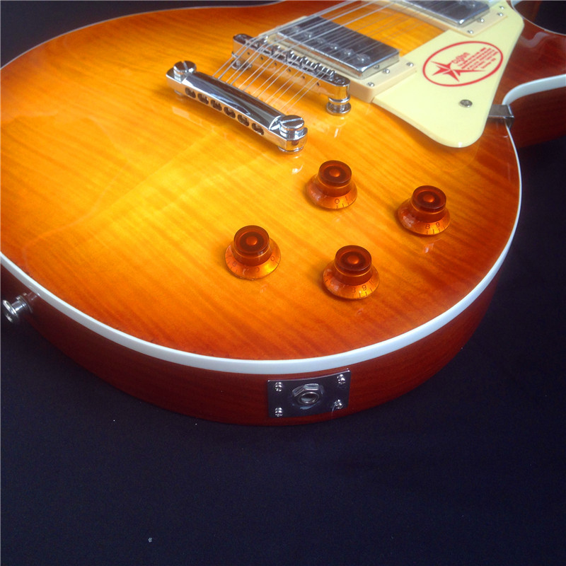 Standard LP electric guitar with gold hardware and flower inlay