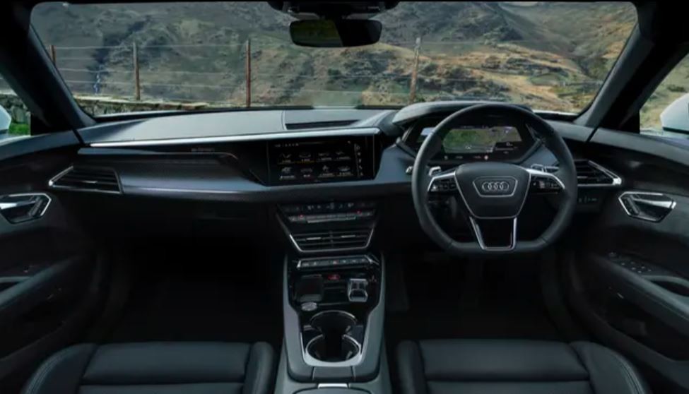 a low, long, wide and lean looking four-door car at 2023Audi e-Tron GT pure Electric Car 673hp 480km New energy vehicle