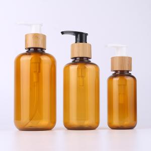 Quality Amber Glass Bamboo Cosmetic Bottle With Wooden Cap Engraving Lotion Sprayer wholesale