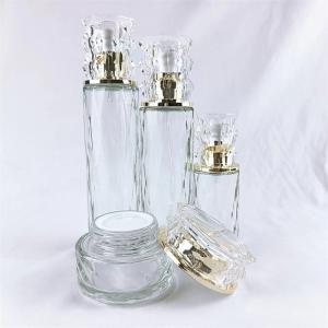Quality 50ml 100ml Cosmetic empty glass jar with gold cap wholesale