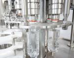 Rotary Type Auto Liquid Filling Machine Beverage Filling Machine 1800 KG