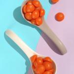Oil Coating Lutein Easters Fruit Gummy Vitamins Ball Shaped With Orange Flavor