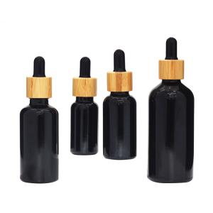 Quality Black Glass Serum Dropper Bottle With Bamboo Lid 1oz 2oz 4oz wholesale