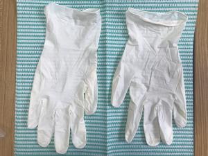 Quality Disposable Powder Free Vinyl Gloves Stretch Creamy Color Vinyl Gloves wholesale