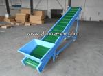 Hopper cleated belt conveyor