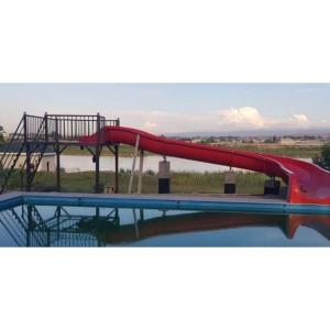Quality Weather Resistance Fiberglass Backyard Water Slide For Kids With Stairs wholesale