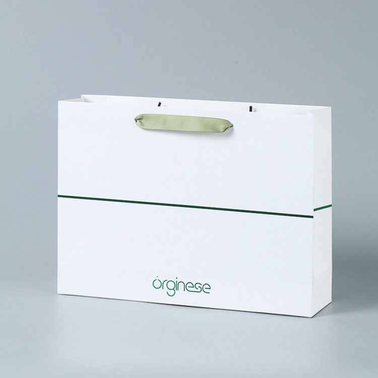 Customized Logo Accepted Ivory Board Paper Bags for Boutique Requirement