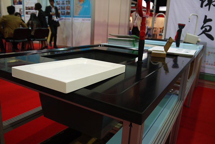 Chemical resistance monolithic drop In sinks for testing center