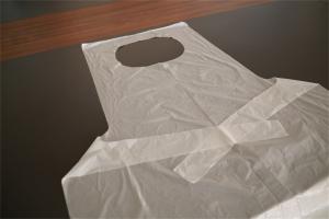 Quality Embossed Waterproof Disposable Adult Aprons Food Processing Single Folded wholesale