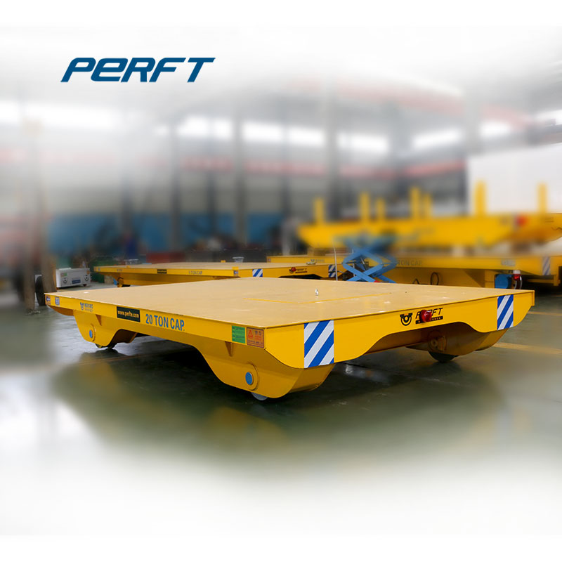 Cable reel powered rail moving transfer vehicle for spray booths