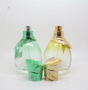 Quality 55ml fancy hot sale round perfume bottle with leaf collar wholesale
