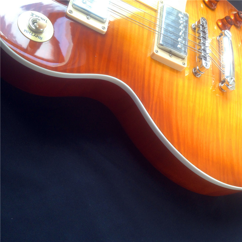 Standard LP electric guitar with gold hardware and flower inlay