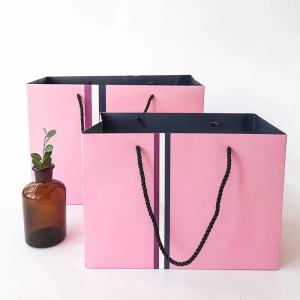 Quality Washable 21x11x27cm 350g UV CMYK 160gsm Non Woven Paper Bag wholesale