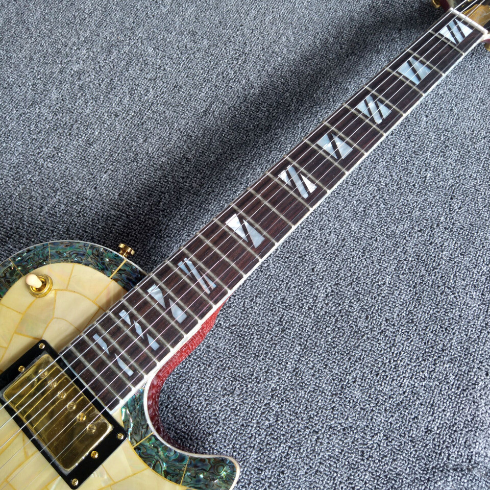 New arrival shell electric guitar with 6 strings guitar and gold pickups