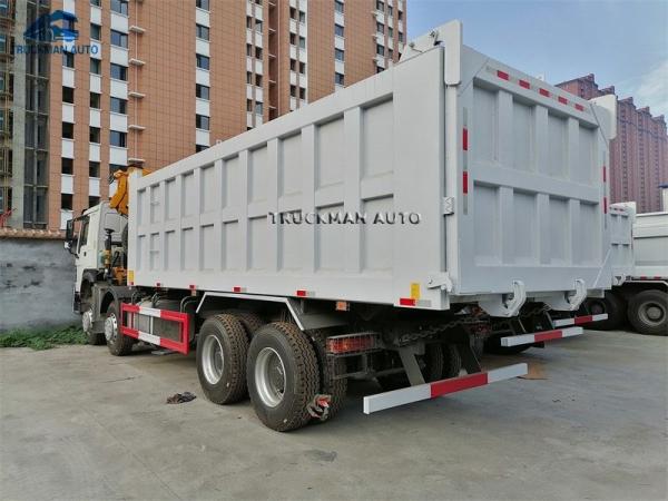 Cheap 50 Tons 23.5m3 Sinotruk Dump Truck With Crane for sale