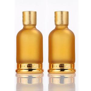 Quality Luxury Gold Dropper Frosted Glass Essential Oil Bottle Round Shape wholesale