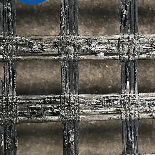 50kn/M-200kn/M Self Adhesive Fiberglass Geogrid With Asphalt Coating