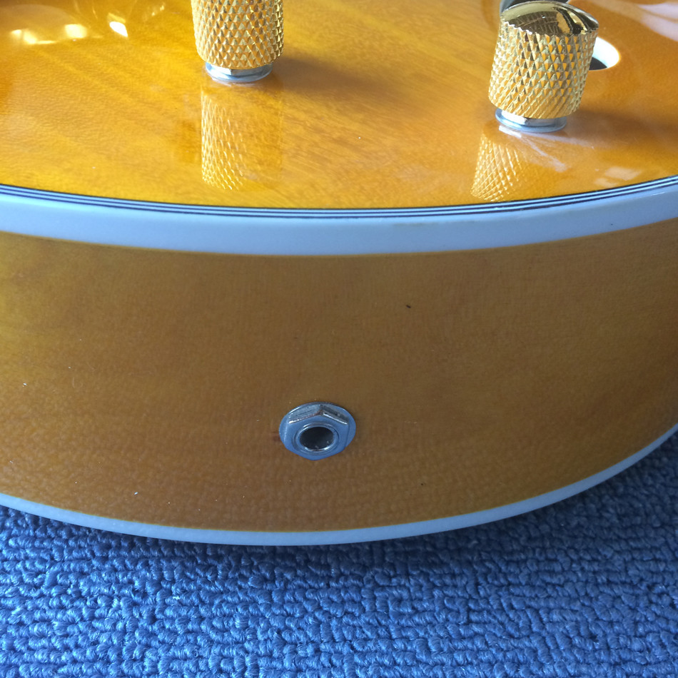 New style high-quality hollow body jazz electric guitar, Double F holes,Tremolo system ,Flame Maple top
