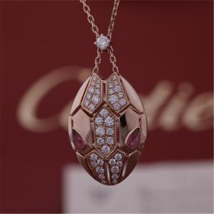 Quality Roman Serpenti necklace in 18 kt rose gold set with rubellite eyes and with pavé diamonds on the head wholesale