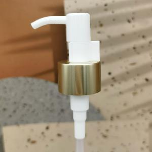 Quality 24/410 Long Nozzle Plastic Cosmetic Lotion Pump Gold Aluminum Closure Metal Shell With Clip wholesale