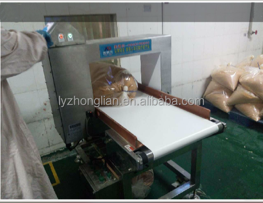 State-of-the-Art Metal Detector for Food Detection Industry Facing the Display Screen