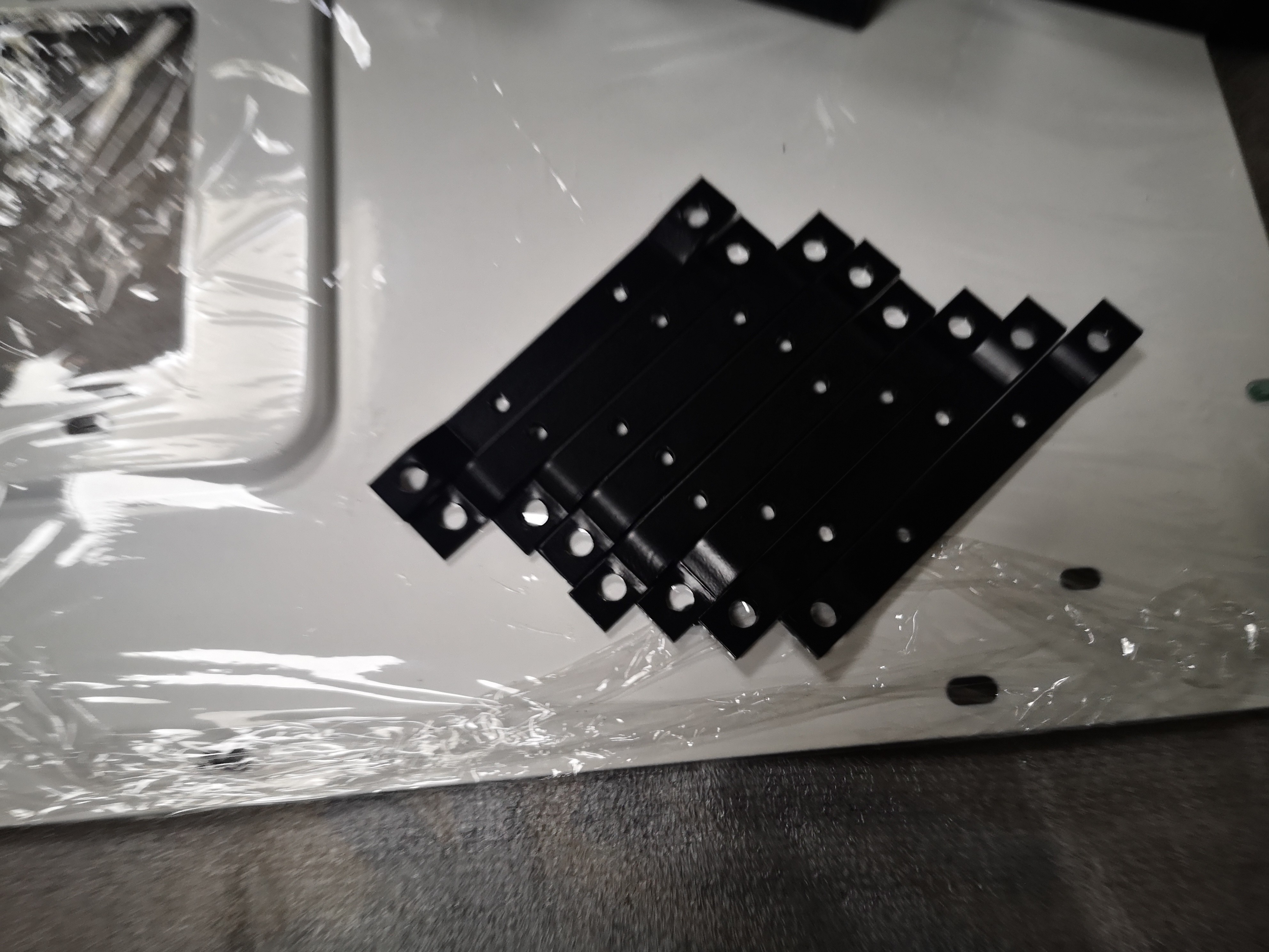 Custom Black Powder-Coated Stamped Mounting Brackets | Multi-Hole Sheet Metal Support Plates | Precision Bending Steel Fixing Parts for Industrial and