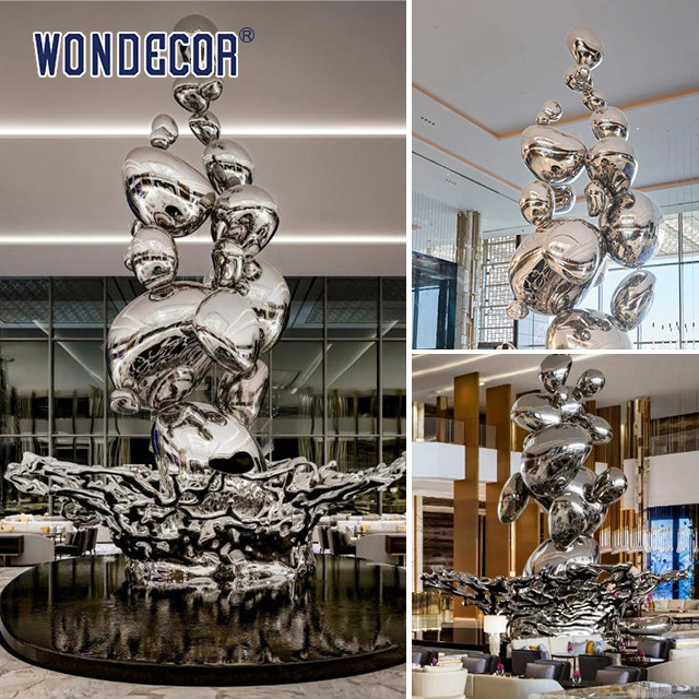 Large Forged Metal Sculpture Water Droplets And Splashes In Hotel Lobby