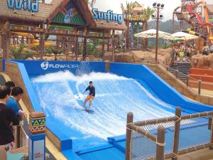 Quality 165kw Standard Size Surf Simulator Machine Swimming Pool Water Slide wholesale