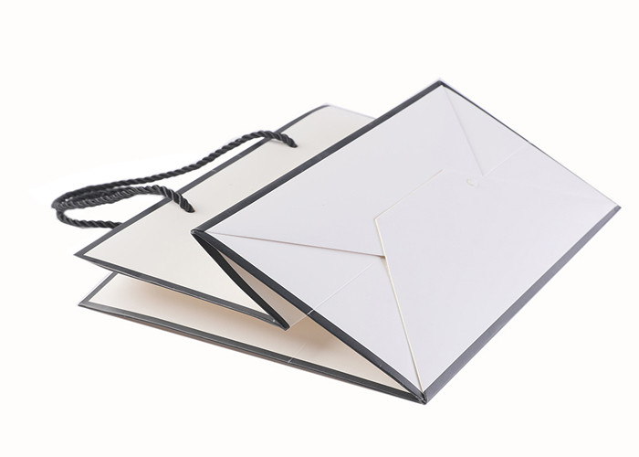 OEM / ODM White Merchandise Bags , Biodegradable Paper Carrier Bags With Logo