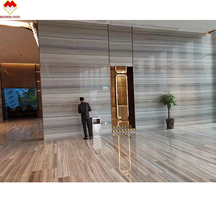 White Wood Look Marble Tiles Stair Follow Veins for a Versatile and Timeless Design
