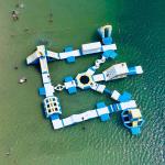 0.9mm PVC Tarpaulin Inflatable Floating Water Park Games 100 Person Capacity